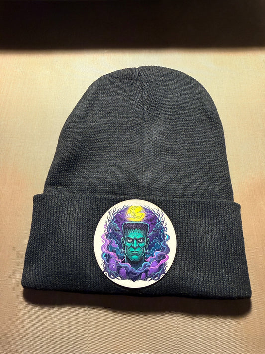 Black cuffed beanie with Frankenstein patch from 76109 Design