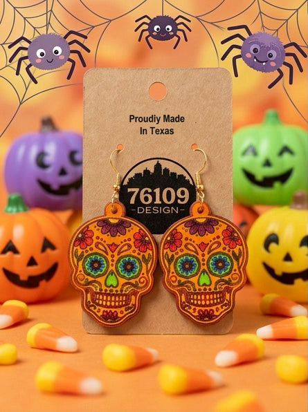 Orange sugar skull earrings on a 76109 Design card