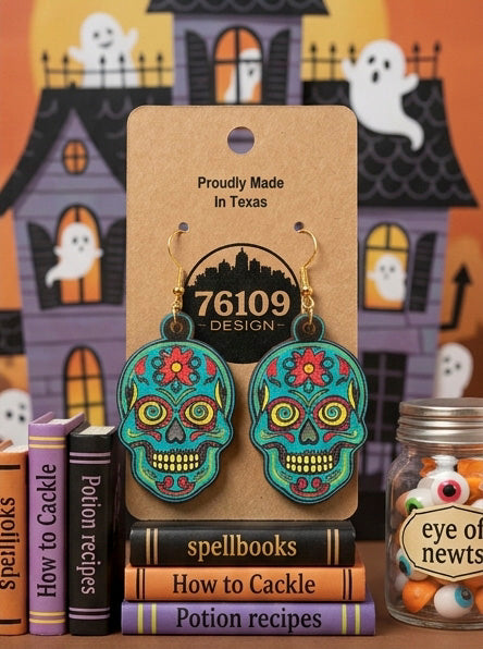 Teal sugar skull earrings on a 76109 Design card